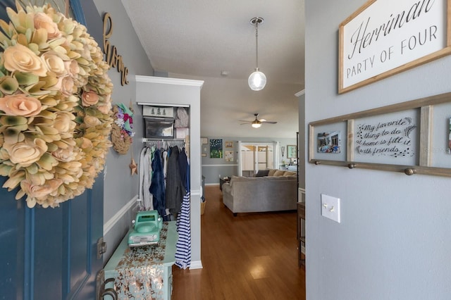 hall featuring wood finished floors
