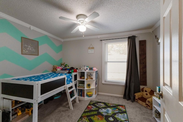 carpeted bedroom with crown molding, a textured ceiling, a ceiling fan, and baseboards