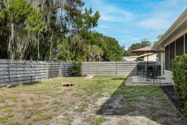 6442 Colonial Dr, Sarasota, FL 34231 - fenced backyard with a patio