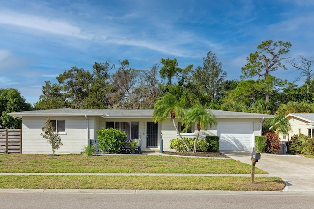 6442 Colonial Dr, Sarasota, FL 34231 - ranch-style home featuring a garage and driveway