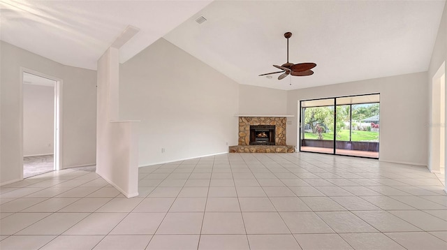 5004 32nd St E, Bradenton, FL 34203 - unfurnished living room featuring a ceiling fan, lofted ceiling, light tile patterned floors, a fireplace, and baseboards