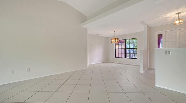 5004 32nd St E, Bradenton, FL 34203 - unfurnished room featuring a chandelier, light tile patterned flooring, and baseboards