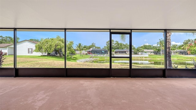 5004 32nd St E, Bradenton, FL 34203 - unfurnished sunroom featuring a water view and a residential view