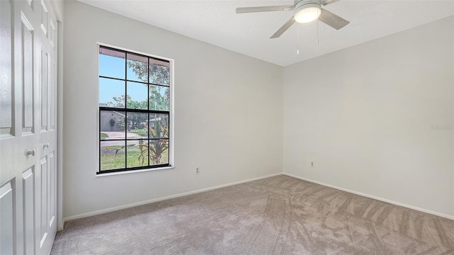 5004 32nd St E, Bradenton, FL 34203 - carpeted spare room featuring baseboards and ceiling fan