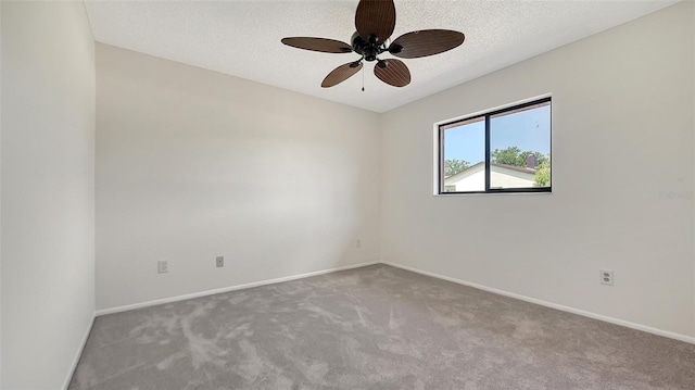 5004 32nd St E, Bradenton, FL 34203 - spare room with carpet flooring, ceiling fan, baseboards, and a textured ceiling