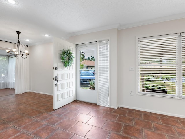 635 N Jefferson Ave Unit 635, Sarasota, FL 34237 - foyer featuring crown molding, a chandelier, baseboards, recessed lighting, and a textured ceiling