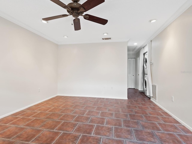 635 N Jefferson Ave Unit 635, Sarasota, FL 34237 - unfurnished room with estacked washer and dryer, a ceiling fan, crown molding, recessed lighting, and baseboards