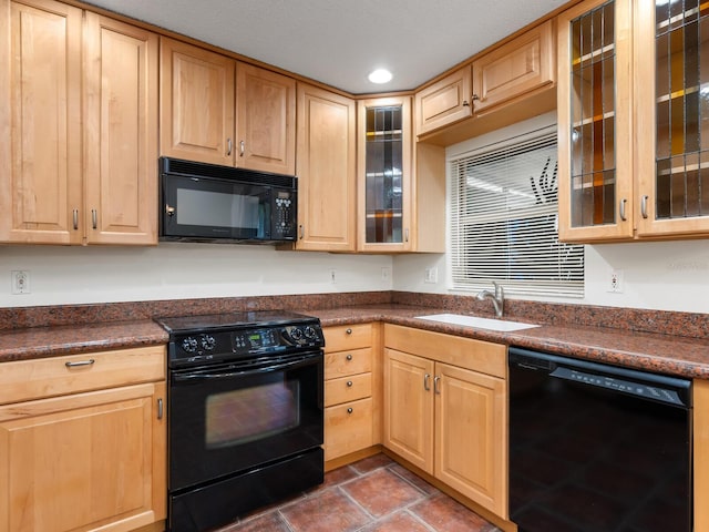 635 N Jefferson Ave Unit 635, Sarasota, FL 34237 - kitchen featuring black appliances, light brown cabinetry, a sink, and recessed lighting