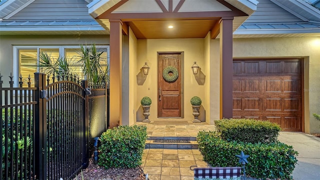 1934 Bougainvillea St, Sarasota, FL 34239 - doorway to property featuring stucco siding, a standing seam roof, and metal roof