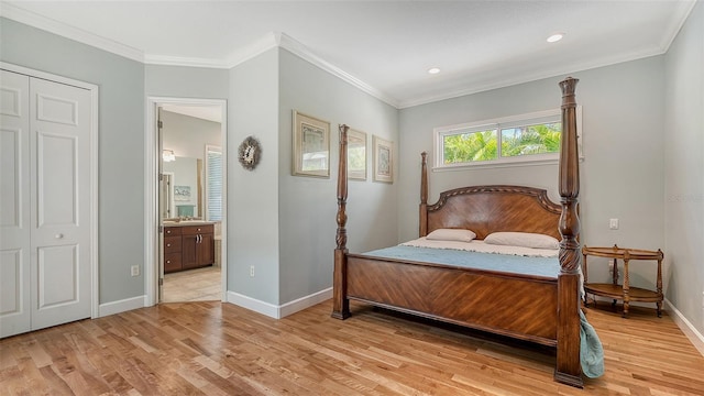 1934 Bougainvillea St, Sarasota, FL 34239 - bedroom featuring light wood finished floors, baseboards, recessed lighting, crown molding, and ensuite bathroom