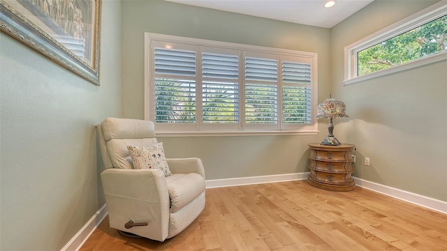1934 Bougainvillea St, Sarasota, FL 34239 - living area with wood finished floors, baseboards, and recessed lighting