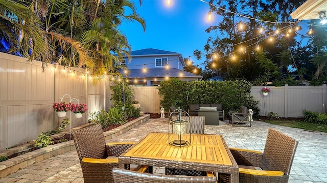 1934 Bougainvillea St, Sarasota, FL 34239 - fenced backyard with a patio and outdoor dining area