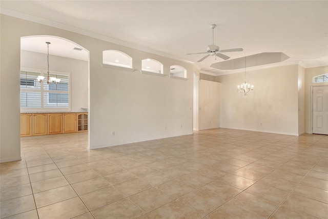 unfurnished room with a chandelier, a ceiling fan, light tile patterned flooring, crown molding, and arched walkways