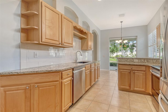 kitchen featuring a sink, appliances with stainless steel finishes, open shelves, and tasteful backsplash