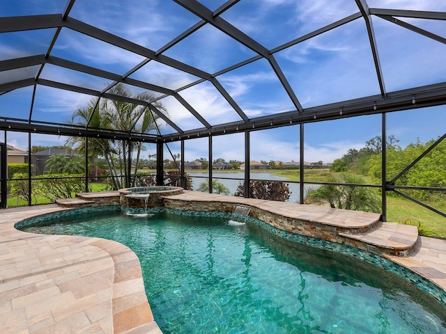 view of pool featuring a water view, a pool with connected hot tub, a patio area, and a lanai