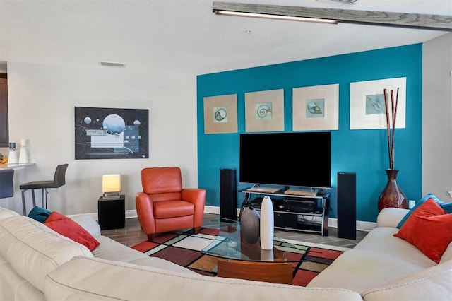 3430 77th St W Unit 103, Bradenton, FL 34209 - living room with baseboards
