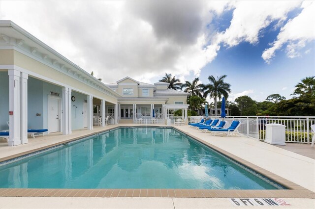 3430 77th St W Unit 103, Bradenton, FL 34209 - community pool with a patio and fence