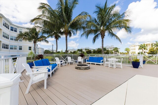 3430 77th St W Unit 103, Bradenton, FL 34209 - deck featuring an outdoor living space with a fire pit