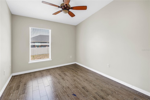 2499 Trimble Ave, North Port, FL 34288 - empty room featuring dark wood finished floors, a ceiling fan, and baseboards