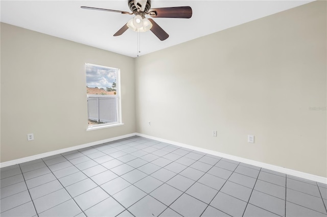 2499 Trimble Ave, North Port, FL 34288 - tiled empty room with a ceiling fan and baseboards