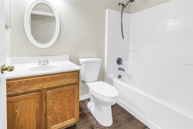 2499 Trimble Ave, North Port, FL 34288 - bathroom with toilet, vanity, shower / bath combination, wood finished floors, and baseboards
