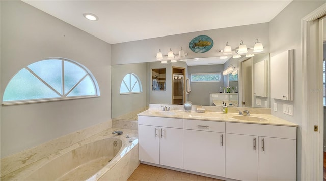 bathroom with healthy amount of natural light, double vanity, a bath, and a walk in shower