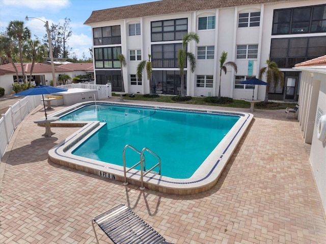 community pool with fence