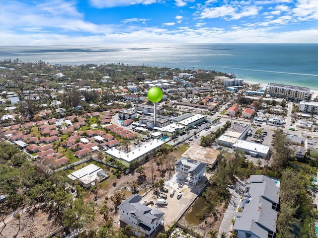 aerial overview of property's location with a nearby body of water