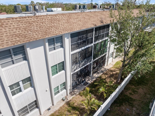 view of property featuring central AC unit