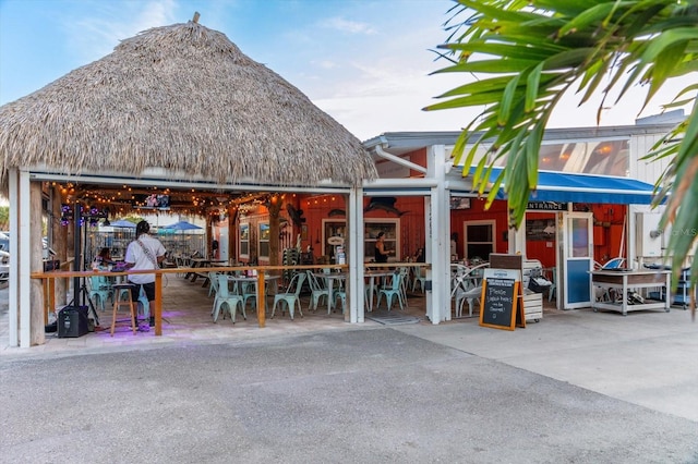 view of property's community with outdoor dining area