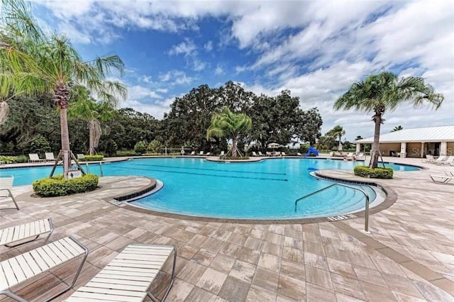 community pool with a patio