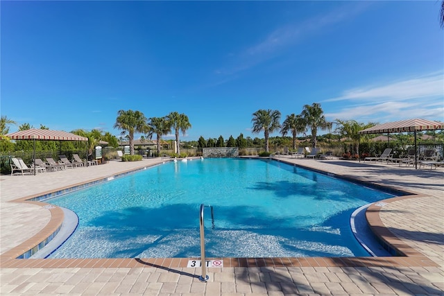 229 Alento Ct, Nokomis, FL 34275 - community pool with a gazebo, a patio area, and fence