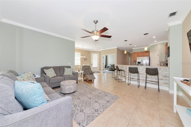 11455 52nd Ct E, Parrish, FL 34219 - living area with ceiling fan, light tile patterned flooring, ornamental molding, recessed lighting, and baseboards
