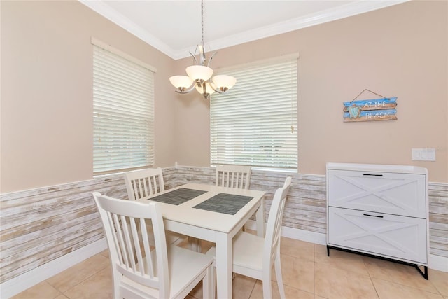 11455 52nd Ct E, Parrish, FL 34219 - dining space featuring a chandelier, ornamental molding, light tile patterned floors, and plenty of natural light