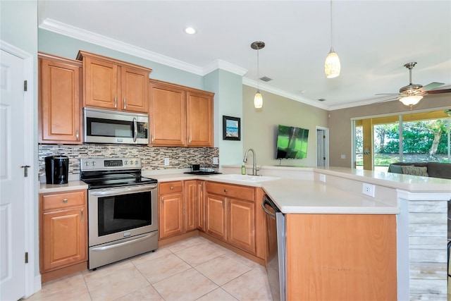 11455 52nd Ct E, Parrish, FL 34219 - kitchen with stainless steel appliances, a sink, a peninsula, decorative backsplash, and light tile patterned flooring