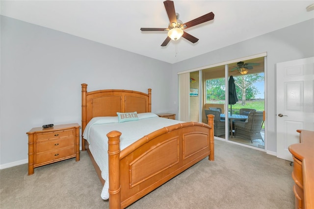 11455 52nd Ct E, Parrish, FL 34219 - bedroom with access to outside, light carpet, baseboards, and a ceiling fan