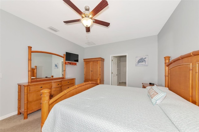 11455 52nd Ct E, Parrish, FL 34219 - bedroom with light carpet, ceiling fan, and baseboards