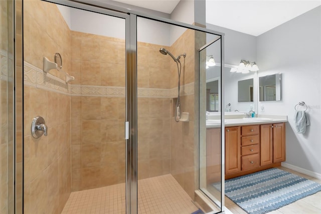11455 52nd Ct E, Parrish, FL 34219 - full bathroom with a stall shower, tile patterned flooring, and double vanity