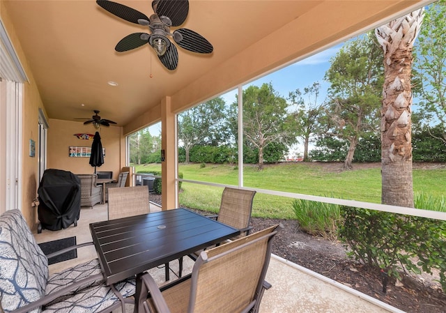 11455 52nd Ct E, Parrish, FL 34219 - view of patio with outdoor dining area, a ceiling fan, and a grill