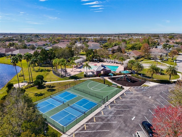 11455 52nd Ct E, Parrish, FL 34219 - aerial view of residential area featuring a pool area and a large body of water