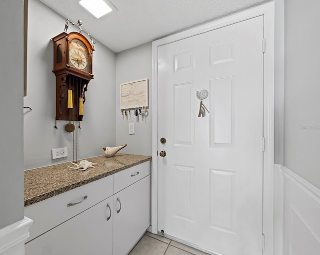bathroom featuring vanity and tile patterned floors