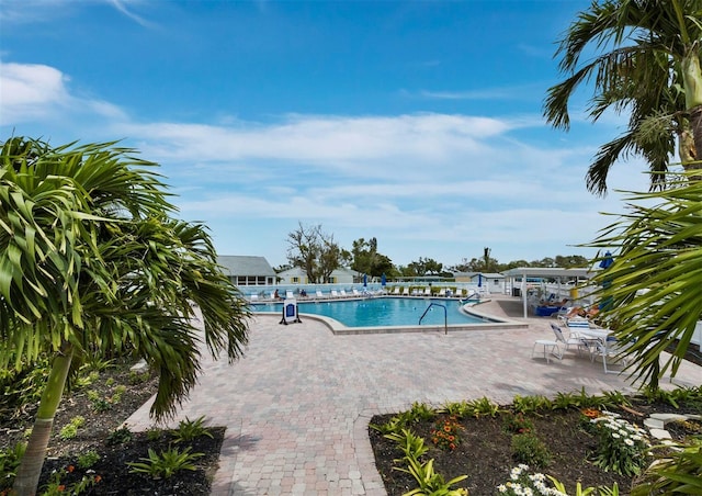 community pool with a patio