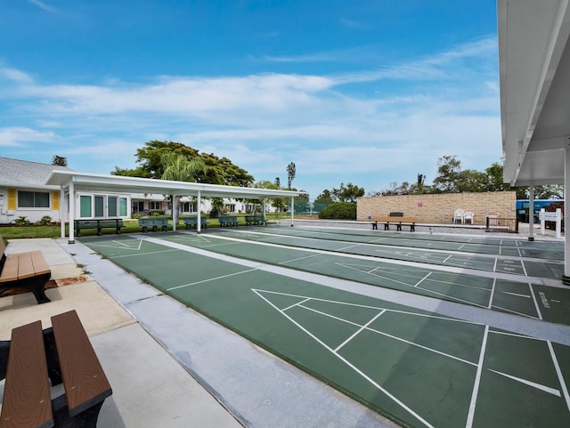 view of home's community with shuffleboard