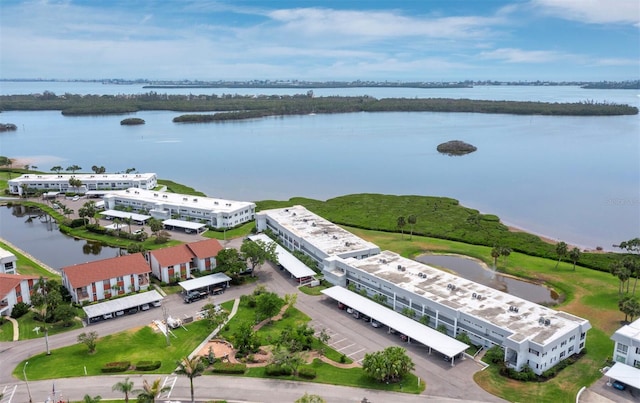 aerial view of a nearby body of water and apartment complex