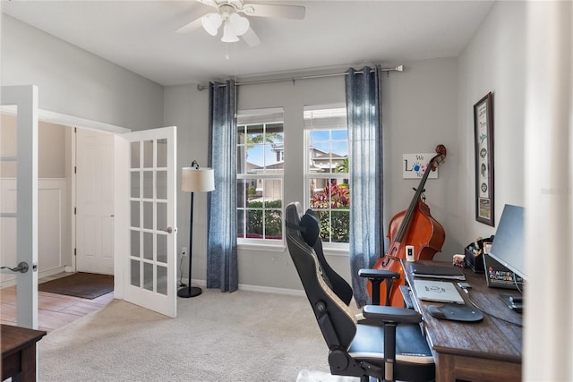 office with french doors, a ceiling fan, carpet floors, and baseboards