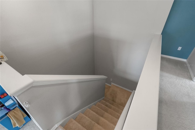 stairs with carpet flooring and baseboards