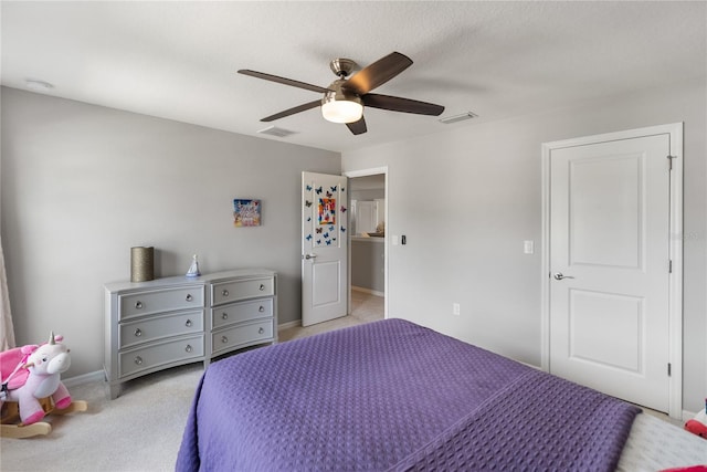 bedroom featuring light carpet, ceiling fan, and baseboards