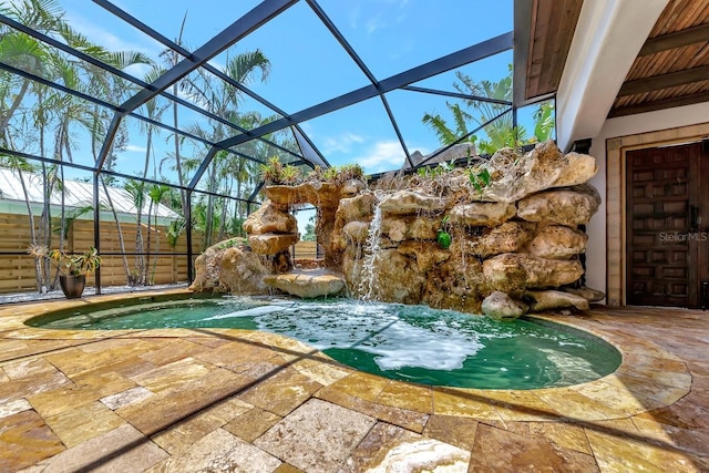 view of pool with a patio area and a jacuzzi