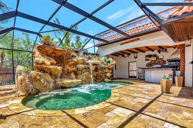 view of swimming pool with a jacuzzi, a patio area, a ceiling fan, and glass enclosure
