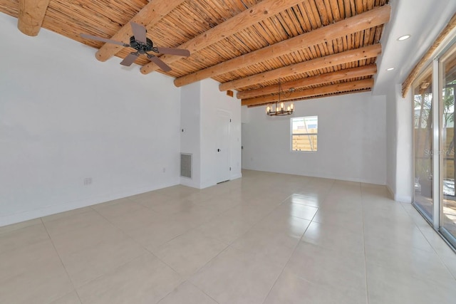tiled spare room featuring wood ceiling, healthy amount of natural light, beam ceiling, a chandelier, and a ceiling fan